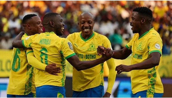 Sundowns' South African defender Aubrey Modiba celebrates with teammates after scoring his team's goal during the CAF Champions League final against AS FAR