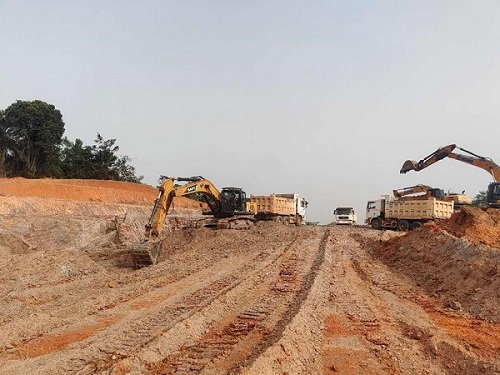Earth moving machines working on the Enchi–Elubo road project