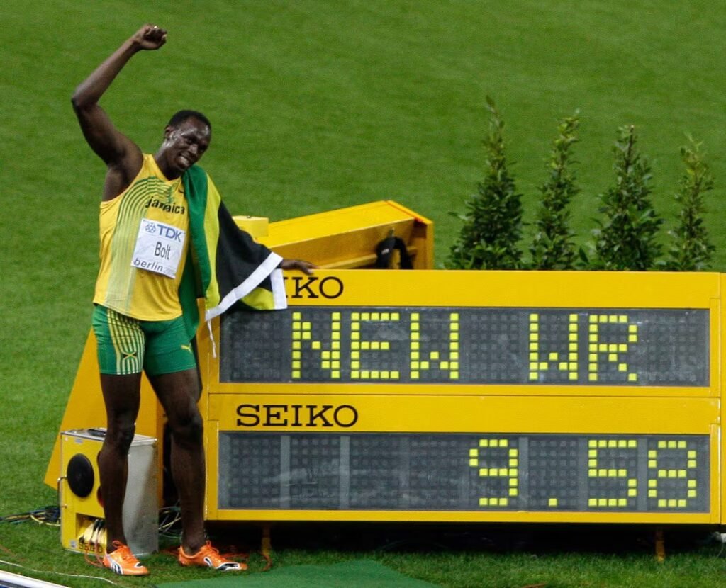 Usain Bolt celebrates winning the men's 100 metres final in 2009