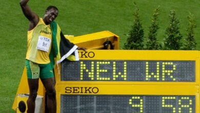 Usain Bolt celebrates winning the men's 100 metres final in 2009