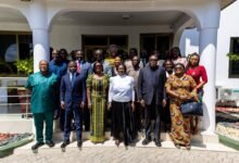 Vice President Prof. Opoku-Agyemang (third from right), Mr Akandoh (second from left), with Ms Darko-Opoku (third from left) and other officials after the meeting