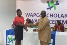 Dr Doku (right) presenting a certificate to Ms Mensah, a Fashion Design student at the TTU