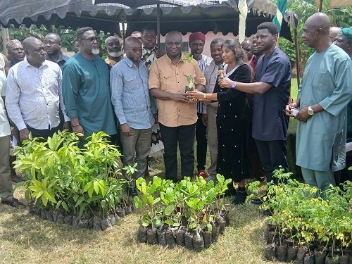 Ms Narahari (third from right) presenting improved planting materials to Mr Eric Opoku,Minister of Food and Agriculture