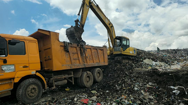 A refuse dump being cleared by Zoomlion Nairobi