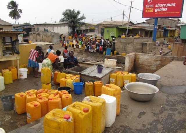 • Residents queue with gallons to get water