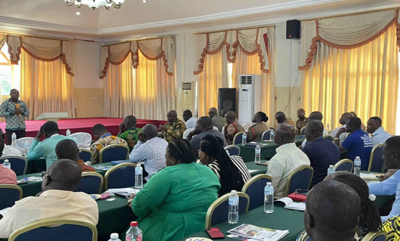 • Mr Fiati (infront) addressing participants at the workshop