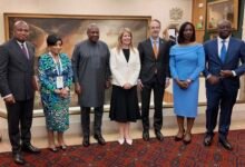 President Mahama (third from left) with some Ministers of State and UK officials at the event