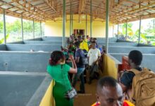 Dignitaries inspecting the new piggery facility during the inauguration ceremony