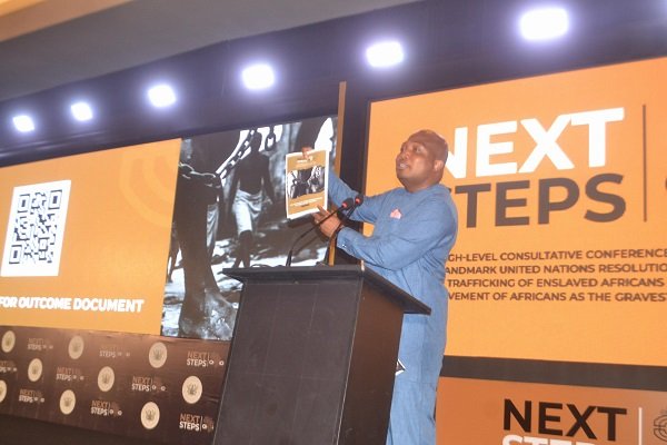 Mr Ablakwa showing the framework document to the participants during the conference Photo Victor A. Buxton