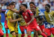 Cape Verde players join Kevin Pina (6) to celebrate his goal against Uruguay