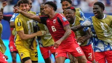 Cape Verde players join Kevin Pina (6) to celebrate his goal against Uruguay