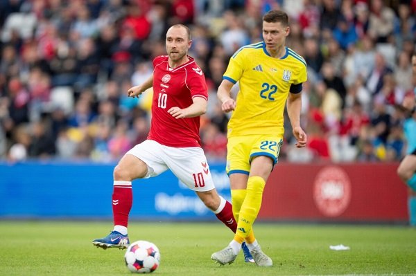 Denmark's Christian Eriksen, left, in action with Ukraine's Mykola Matviyenko during an international football game, in Odense, Denmark, Sunday, June 7, 2026. (Bo Amstrup/Ritzau Scanpix via AP)