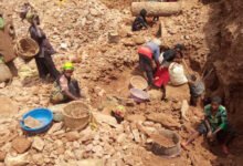 Congolese miners work at an artisanal gold mine near Kamituga in the east of the Democratic Republic of Congo