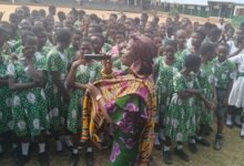 Nana Mozu addressing students at Apremdo Catholic School.