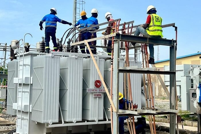 Some ECG engineers and technicians installing the new power transformer