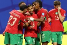 Gessime Yassine celebrates scoring their fourth goal with teammates