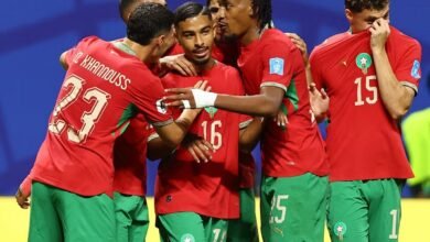 Gessime Yassine celebrates scoring their fourth goal with teammates
