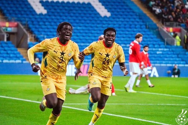 Goalscorer Caleb Yirenkyi (left) in joined by provider Ernest Nuamah to celebrate Ghana's win