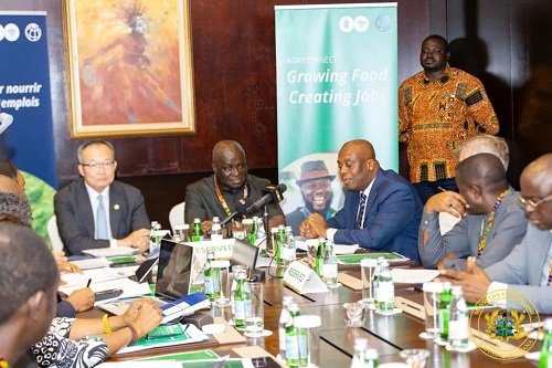 Mr Ampem (third from right) speaking at the launch .