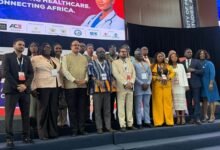 Dr Adam (fifth from right) with dignitaries after the event