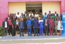 Dr. Otabil (sixth from right), with Bank of Ghana officials and journalists after the workshop