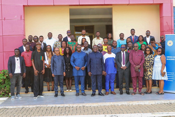 Dr. Otabil, (sixth from right), with officials from the Bank of Ghana and journalists after the workshop