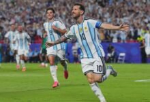 Lionel Messi leads the celebration after scoring the opener