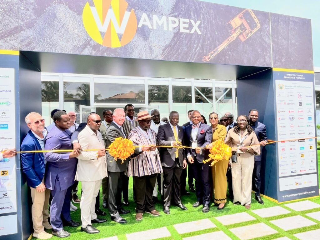 • Mr Buah (fifth from right) being assisted by Mr Akafia (fourth from right), Dr Ashigbey (fifth from left) and other dignitaries to cut the ribbon for the official opening of the expo