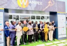 • Mr Buah (fifth from right) being assisted by Mr Akafia (fourth from right), Dr Ashigbey (fifth from left) and other dignitaries to cut the ribbon for the official opening of the expo