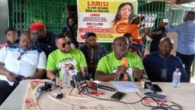 Mr Paul Anamde (second from right) speaking at the press conference