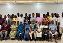 Ms Jonah (seated middle) with other executives and participants