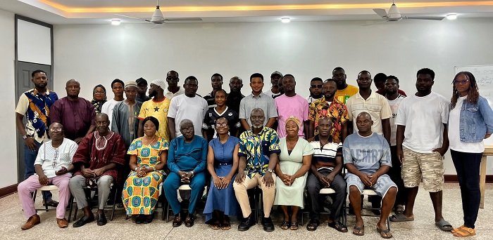 Ms Jonah (seated middle) with other executives and participants