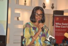 Ms Amekudzi (inset) speaking to the participants at the meeting Photo Victor A. Buxton