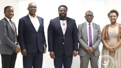 NHIA----Dr Bampoe (middle) with INTERPOL and NHIA officials during the courtesy call