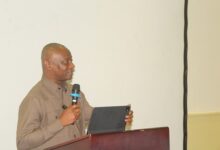 Mr Mensah (inset) addressing stakeholders at the workshop. Photo. Ebo Gorman