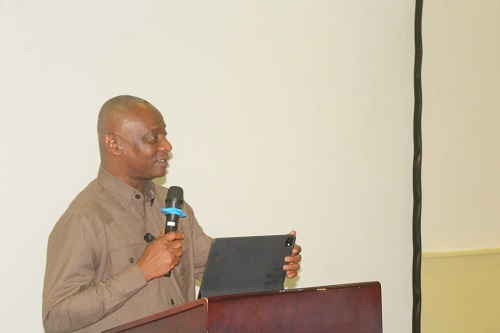 Mr Mensah (inset) addressing stakeholders at the workshop. Photo. Ebo Gorman