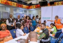First Lady Lordina Mahama waving to beneficiaries being screened during the exercise