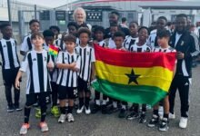 • Kwadwo Asamoah (arrowed) with children