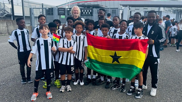 • Kwadwo Asamoah (arrowed) with children