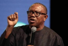 Peter Obi, casts his ballot at a polling unit to cast his vote during Nigeria's presidential election in his home towm