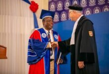 Professor Honyenuga (left) congratulating Prof Tuninga after the lecture