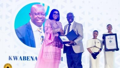 Responsible Journalism Pix---------Mrs Asante-Asiedu (left) receving an award from Sports Broadcaster, Kwabena Yeboah
