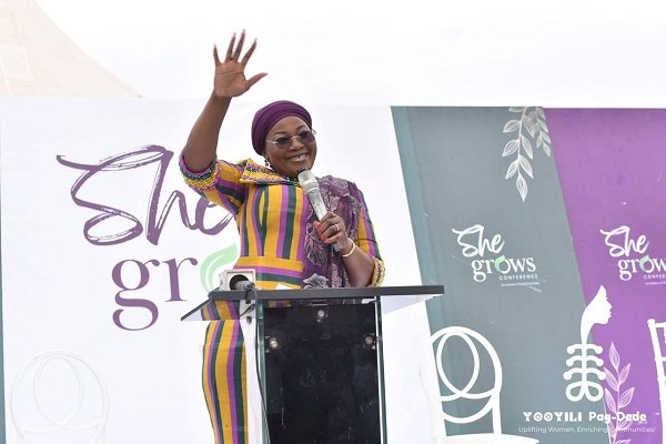 Hajia Abdul Aziz (inset) addressing the beneficiary women
