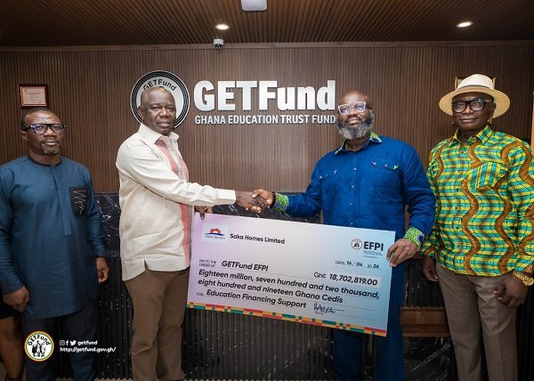 Saka Homes backs GETFund -----Mr Addo-Mensah (second from right) presenting the dummy cheque to Mr Adjei