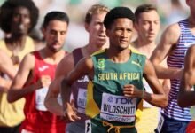South African distance runner Adriaan Wildschutt lead a pack of athletes