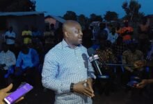 Mr Puozuing addressing residents at the commisioning ceremony