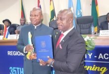 Ambassador Turay (right) officially handing over the Chancellorship to Mr Nikpe