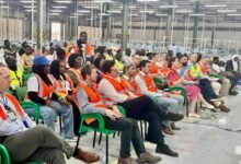 The delegation from the Royal College of Defense Studies during their visit to the factory