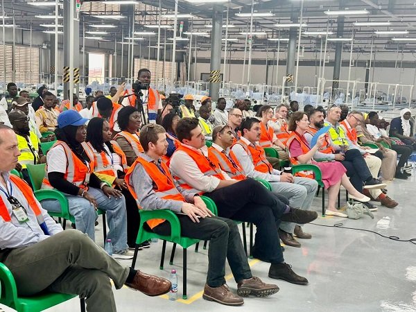 The delegation from the Royal College of Defense Studies during their visit to the factory