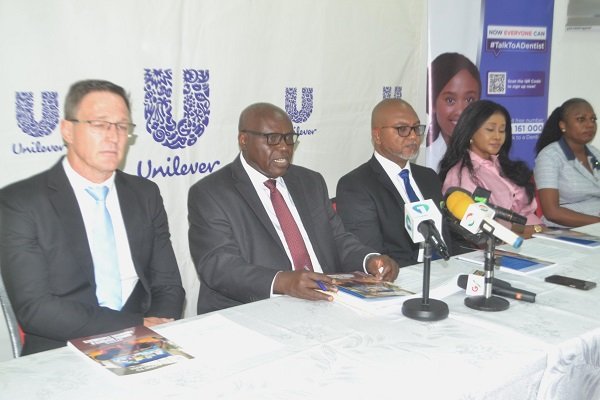 Mr Nimako (second from left) addressing the press at the briefing. With him are Mr Wulff-Caesar (middle) and other members of Unilever Board Photo Victor A. Buxton
